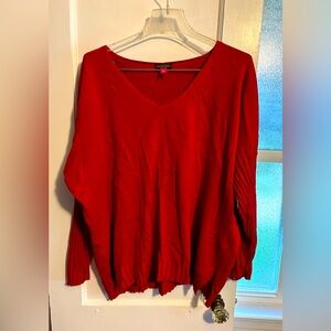 Red oversized sweater with ribbed sleeves